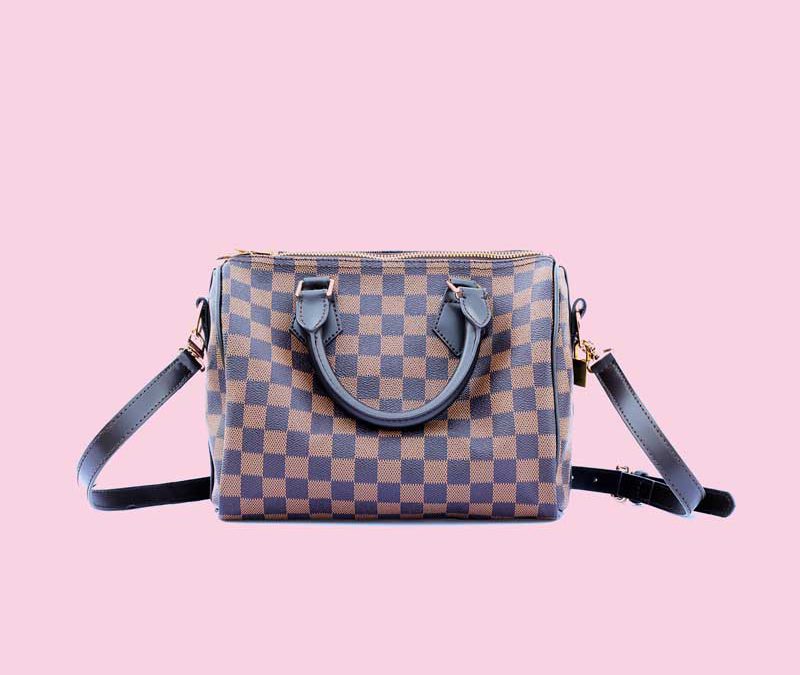 Go checkers and chic! Embrace your love for checks and accessorise your outfit with a statement handbag.